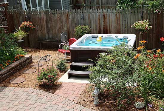 Hot tub with garden landscaping